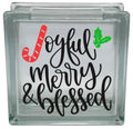 Decorative glass block with 'Joyful Merry & Blessed' text and Christmas graphics on a white background