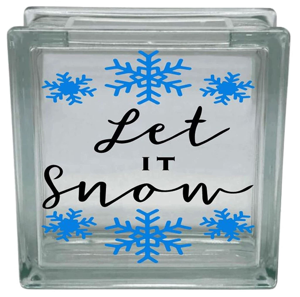 Glass block with 'Let It Snow' text and blue snowflakes on a white background