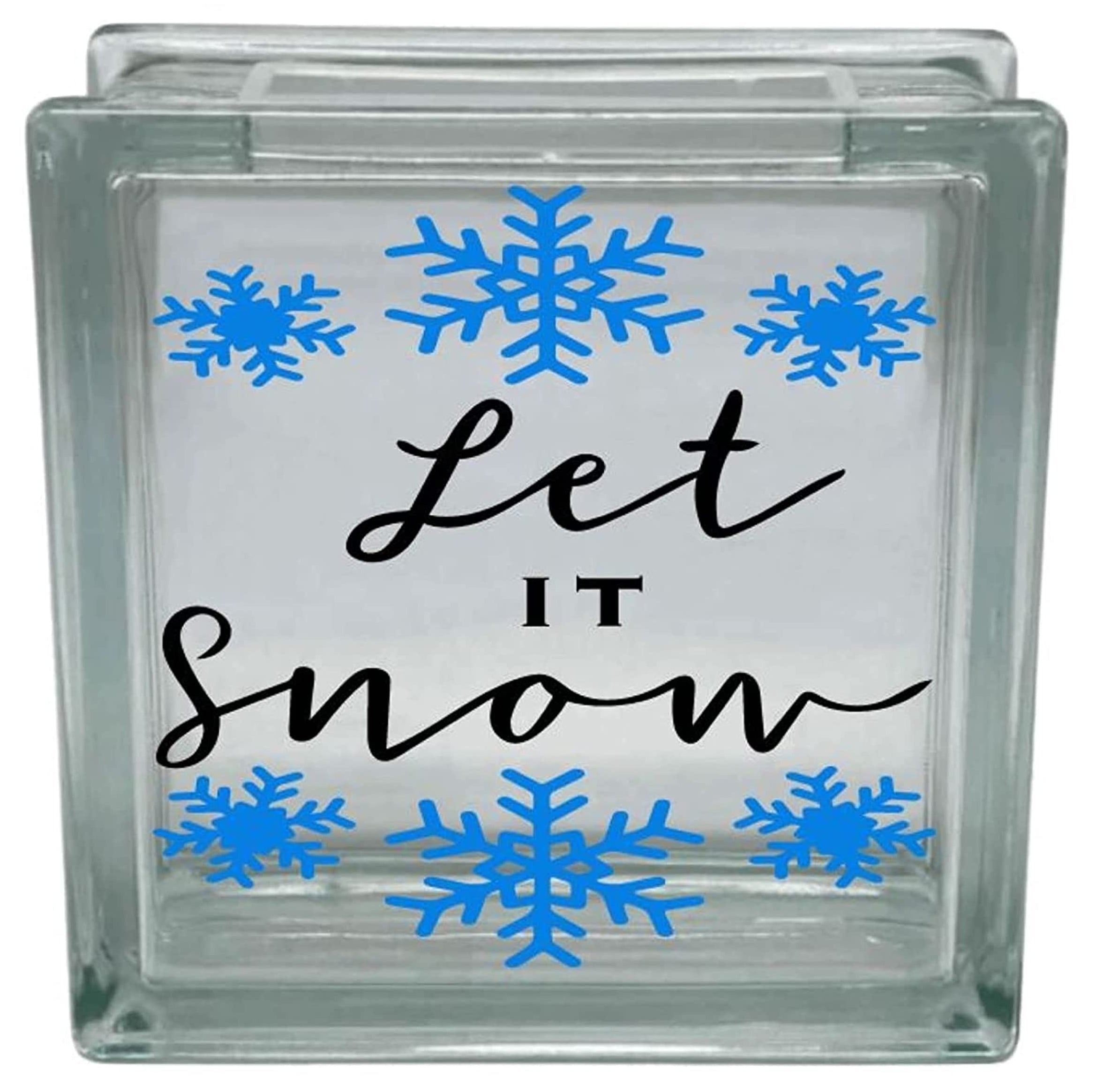 Glass block with 'Let It Snow' text and blue snowflakes on a white background