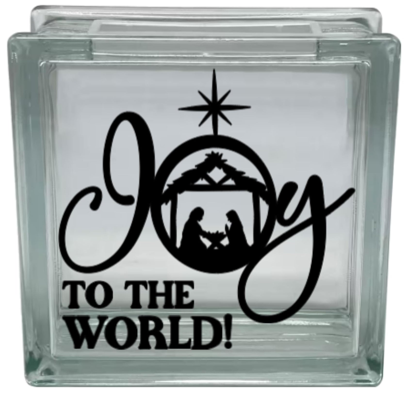 Glass block with 'Joy to the World!' design featuring a nativity scene on a white background