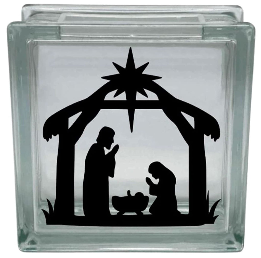 Glass block with a black nativity scene silhouette