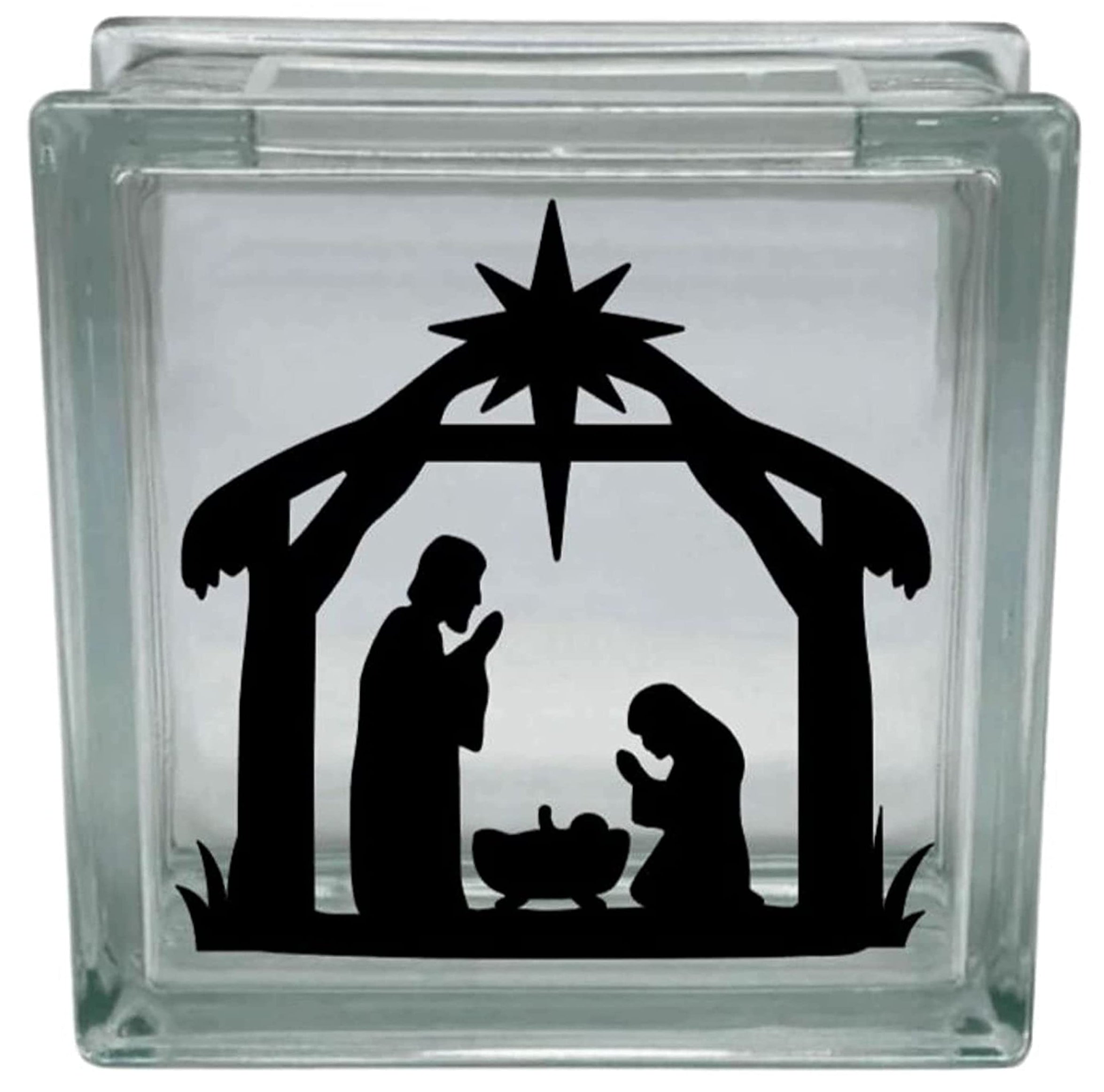 Glass block with a black nativity scene silhouette